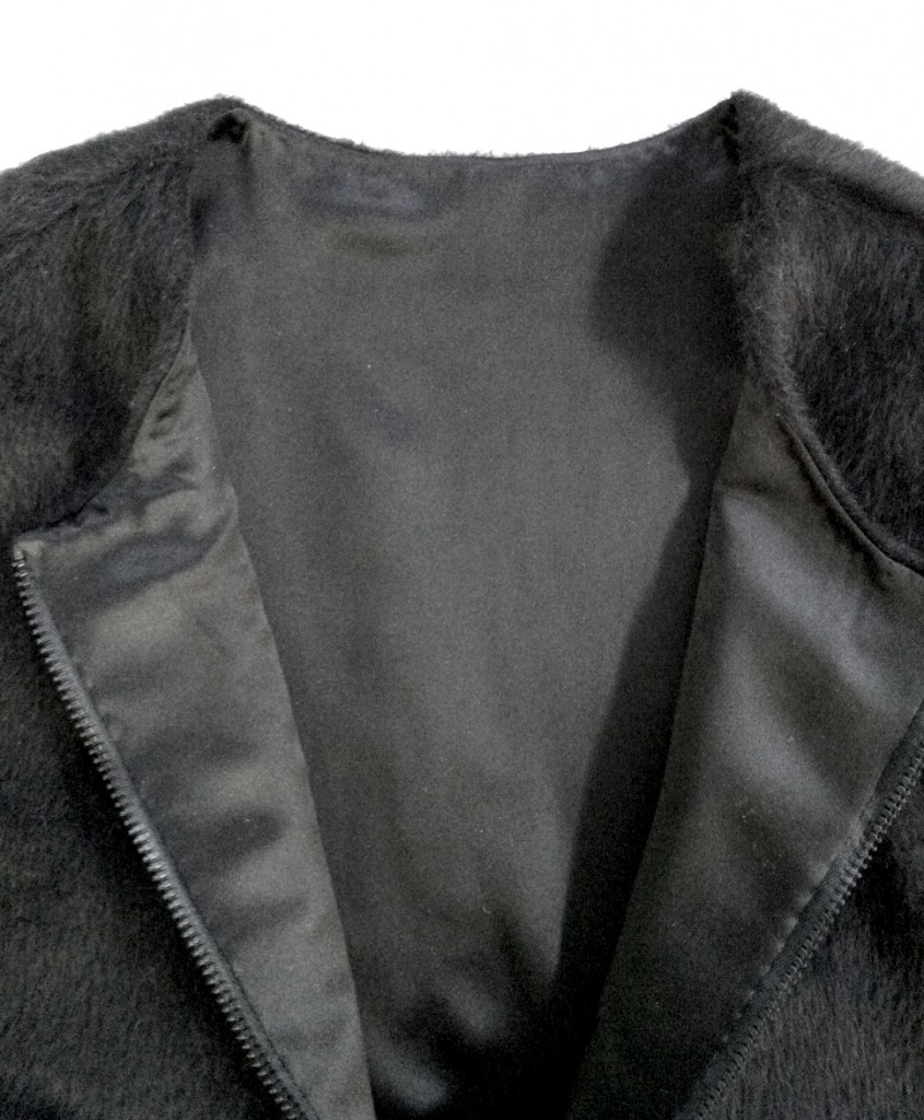 Detail of front-zip vest made with black alpaca from Mood Fabrics NYC.