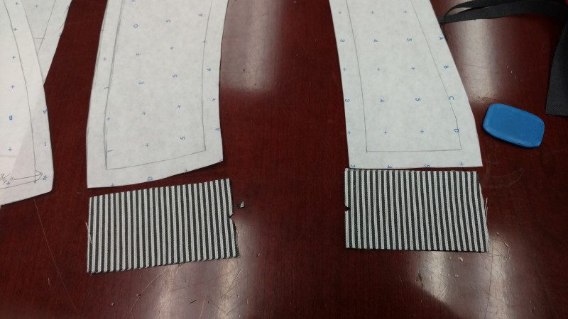 Do the same with the side pieces. The notch is to match the ones on the back and front pieces, while the plain is for the side seams.