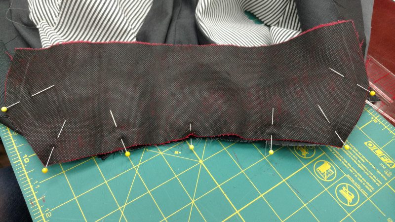 Pin the rest of the collar, easing everything to fit.
